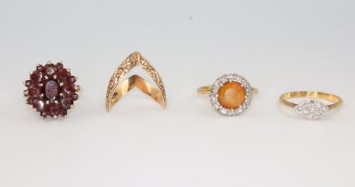 A yellow metal 18ct citrine cluster ring, size L, together with a garnet ditto size K 1/2, a gem set