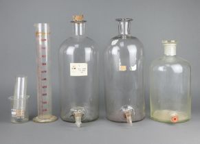 A glass laboratory measuring jug 44cm x 11cm (crack to base) and 3 large glass laboratory bottles