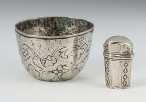 A circular Continental silver cup with repousse decoration 6cm and a Georgian silver scent bottle