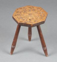 A 19th Century octagonal carved hardwood stool raised on turned supports 36cm h x 26cm w x 26cm d