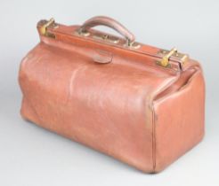 A brown leather Gladstone bag 19cm h x 24cm w x 45cm d The leather is clean and supple