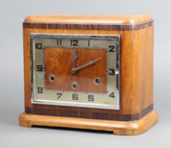 Norland, an Art Deco 8 day chiming mantel clock with square silvered dial and Arabic numerals