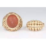 A gentleman's 9ct yellow gold ring, size K 1/2 together with 9ct yellow gold hardstone set ring size