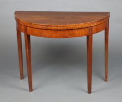 A Georgian style mahogany demi-lune card table raised on square tapered supports 74cm h x 95cm w x