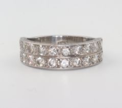 A white metal plat. double half eternity ring approx. 0.4ct, 5.2 grams, size J