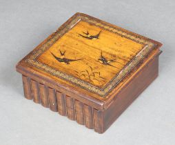 A square inlaid olive wood trinket box, the hinged lid inlaid bluebirds with sliding secret