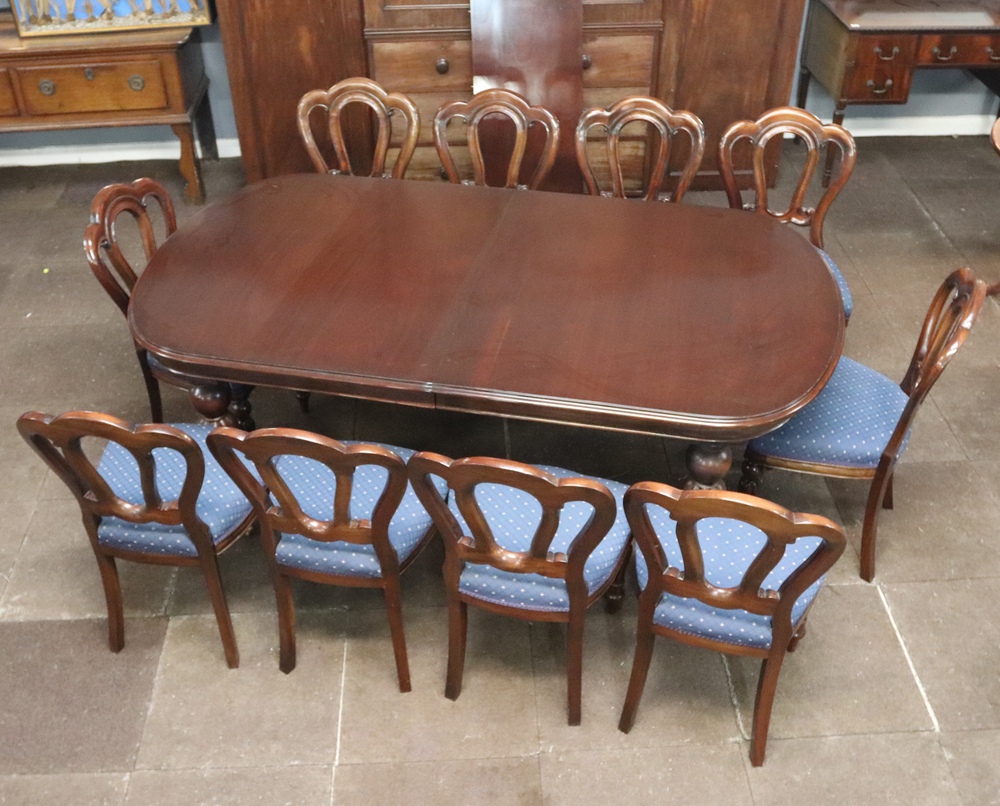 A Victorian style mahogany dining suite comprising oval extending dining table with 1 extra leaf,