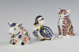 Three Royal Crown Derby Imari pattern paperweights - seated piglet with gold stopper MM 6cm,