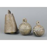 An Eastern bronze bell 12cm x 9cm together with 2 circular Eastern bronze bells 7cm