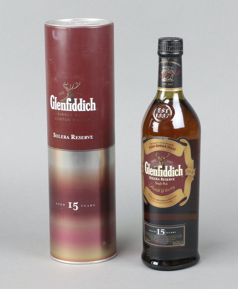 A 70cl bottle of Glenfiddich 15 year old Solera Reserve single malt whisky with canister