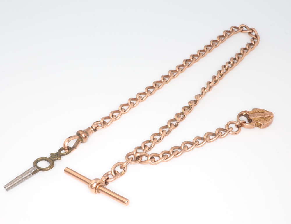 A 9ct yellow gold watch chain with T bar and heart shaped padlock 29.2 grams, 33cm