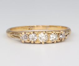 A yellow metal 18ct 5 stone diamond ring, approx. 0.35ct size Q 1/2, 3 grams