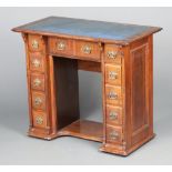 A Victorian mahogany desk with blue leather writing surface, fitted 1 long drawer flanked by 5