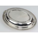 An oval silver entree dish and cover Sheffield 1936, 28cm 903 grams