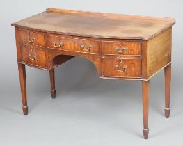 A 19th Century mahogany bow front wash stand/writing table with raised back fitted 1 long and 2