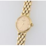 A lady's Longines 18ct yellow gold quartz wristwatch, case numbered 30455587 18mm, on an 18ct yellow