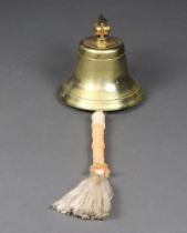 A reproduction brass ships hanging bell 14cm h x 20cm diam.