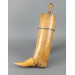 Peal and Co, a 19th Century beech right foot articulated boot tree with brass panel marked Noel E