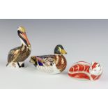 Three Royal Crown Derby Imari pattern paperweights - seated fox the base with gold stopper marked