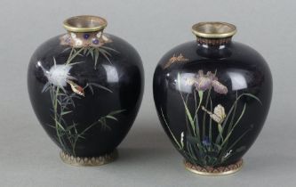 A pair of black ground cloisonne globular shaped vases decorated birds on branches 9cm h One of