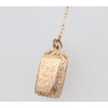 A 9ct yellow gold necklace 5 grams, 70cm and a gilt locket