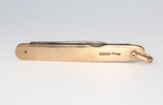 A 9ct yellow gold mounted pocket knife 24.3 grams gross, 80mm The gold case has 2 small cracks and