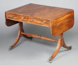 A 19th Century mahogany sofa table fitted 2 frieze drawers, with turned H framed stretcher, brass