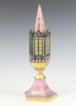 A Victorian porcelain pastel burner in the form of a tower raised on a shaped spreading foot 14cm