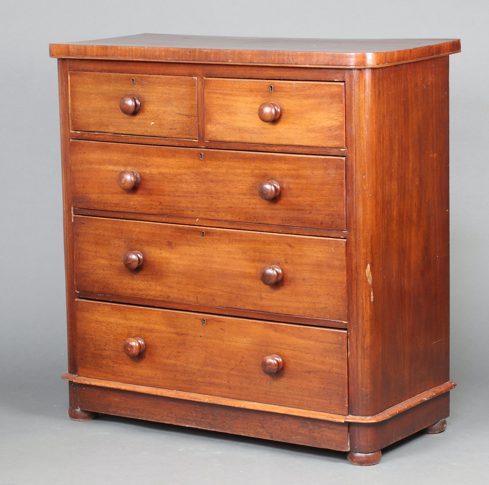 A Victorian mahogany D shaped chest of 2 short and 3 long drawers with turned handles, 106cm h x