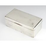 An Art Deco rectangular silver cigarette box Birmingham 1937, 17cm, with engraved inscription
