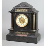 A French 8 day striking mantel clock with 12cm enamelled dial Arabic numerals contained in a
