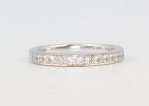 A white metal plat. diamond half eternity ring approx. 0.15ct, 3.4 grams, size K 1/2