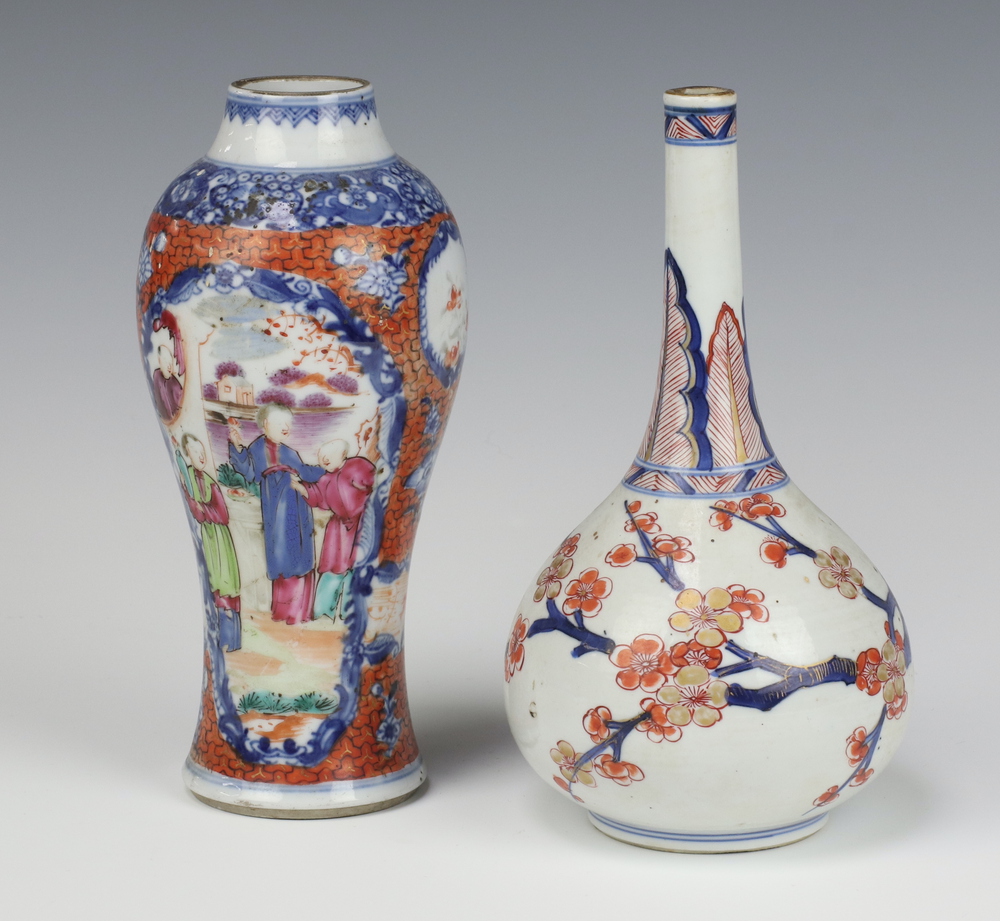 An 18th Century Chinese baluster shaped vase with panel decoration of courtly figures 19cm