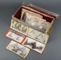 Approximately 50 19th Century Excelsior stereoscopic Tours slides, contained in a card box with