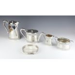 An Edwardian silver plated 4 piece tea and coffee set with kettle stand