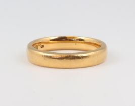 A 22ct yellow gold wedding ring size N 6.1 grams