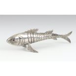 A 19th Century white metal figure of an articulated fish 10cm, 17.1 grams This lot is in good