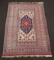 A blue, red and white Kilim rug 241cm x 156cm Hole to top of border, some flecking in places,