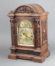 A Victorian triple fusee Grand Sonnier bracket clock, the 18cm arched gilt dial with silvered