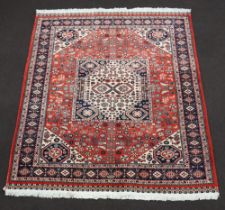 An orange blue and white ground Persian rug with square central medallion 209cm x 171cm Light wear