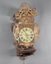 An 18th/19th Century Continental striking alarm wall clock contained in a metal and cast lead case