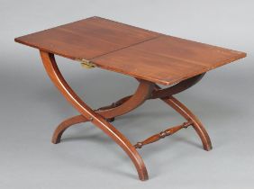A 19th Century style rectangular mahogany folding coaching table raised on X shaped supports with