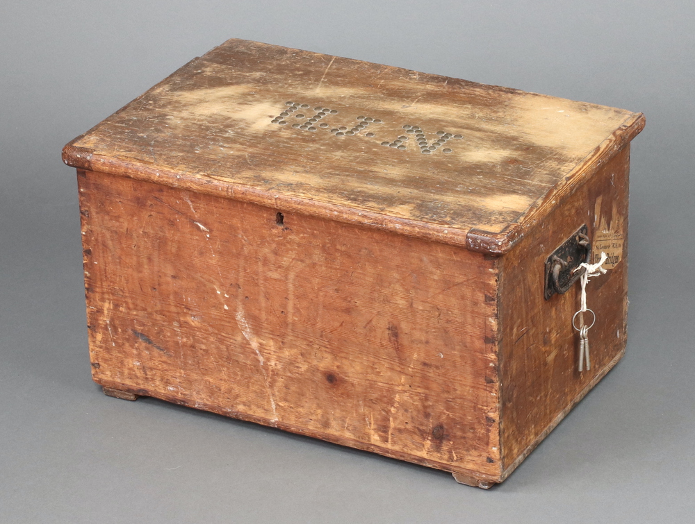 A 19th Century rectangular pine trunk, the lid with stud work initials H J N, fitted interior and