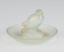 A circular Lalique pin tray Moineau Cendrier No284 the base marked Lalique France 5cm x 9cm Light