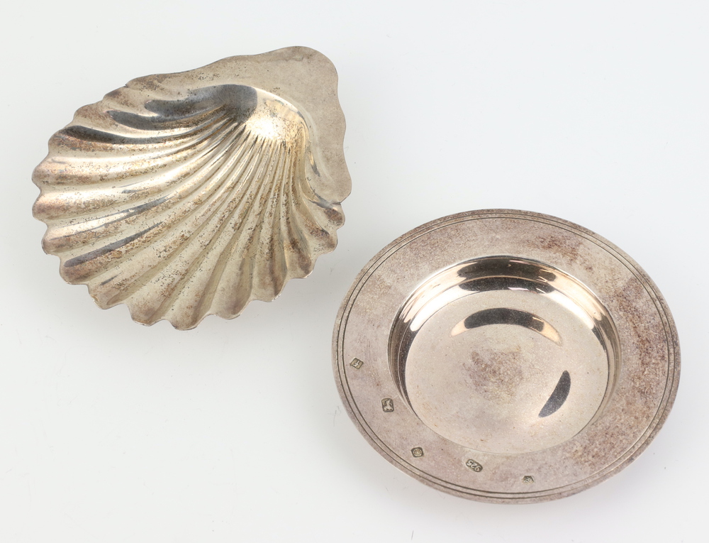 A silver Armada dish Sheffield 2005 together with a silver shell shaped butter dish, 116 grams