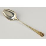 A Stuart Devlin silver and gilt honey spoon with bee terminal, London 1984, 36.7 grams, 16cm There