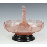 An Art Deco moulded orange glass table centre piece, the centre with standing lady 11cm x 26cm