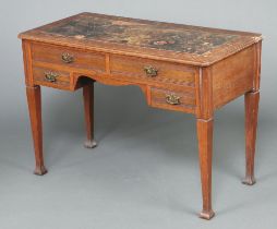 A Victorian oak writing table with inset writing surface above 2 long and 2 short drawers, raised on