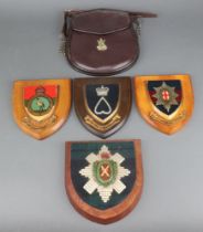 A Military Issue leather sporran with Black Watch badge to the front marked B.H.G 1949 254, 4