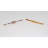 A 9ct yellow gold pearl brooch with steel pin, a yellow metal ditto, gross weight 4.3 grams